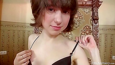 Miki Strips In Black Lingerie And Stockings